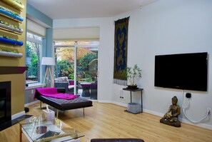 Exclusive Apartment, 1 Bedroom | 1 bedroom, desk, iron/ironing board, travel crib