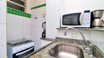 Apartment | Private kitchenette | Fridge, microwave, oven, stovetop
