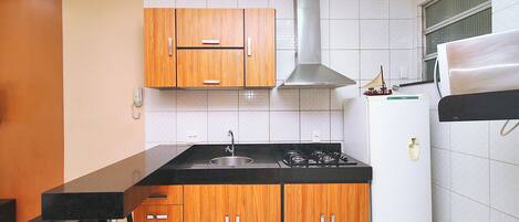 Apartment | Private kitchen | Fridge, microwave, cookware/dishes/utensils