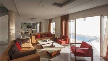 Luxury Villa, 3 Bedrooms | Living room | 32-inch flat-screen TV with satellite channels, TV