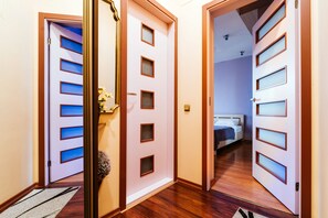 Basic Apartment, 1 Bedroom | Living area | Flat-screen TV - Apartments Victory Square (Minsk)