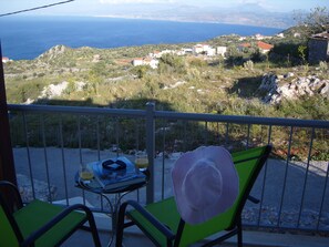 Outdoor dining - Breathtaking Mountain,Sea Views with pool Wifi near shops and offers available (Kefalas)