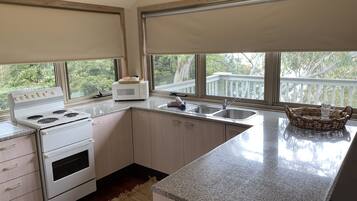 House | Private kitchen | Full-sized fridge, microwave, oven, stovetop