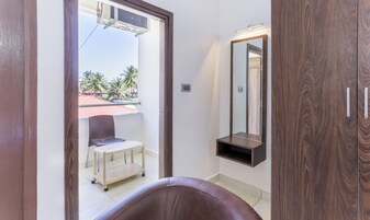 Premium Room | Individually furnished, desk, blackout drapes, iron/ironing board