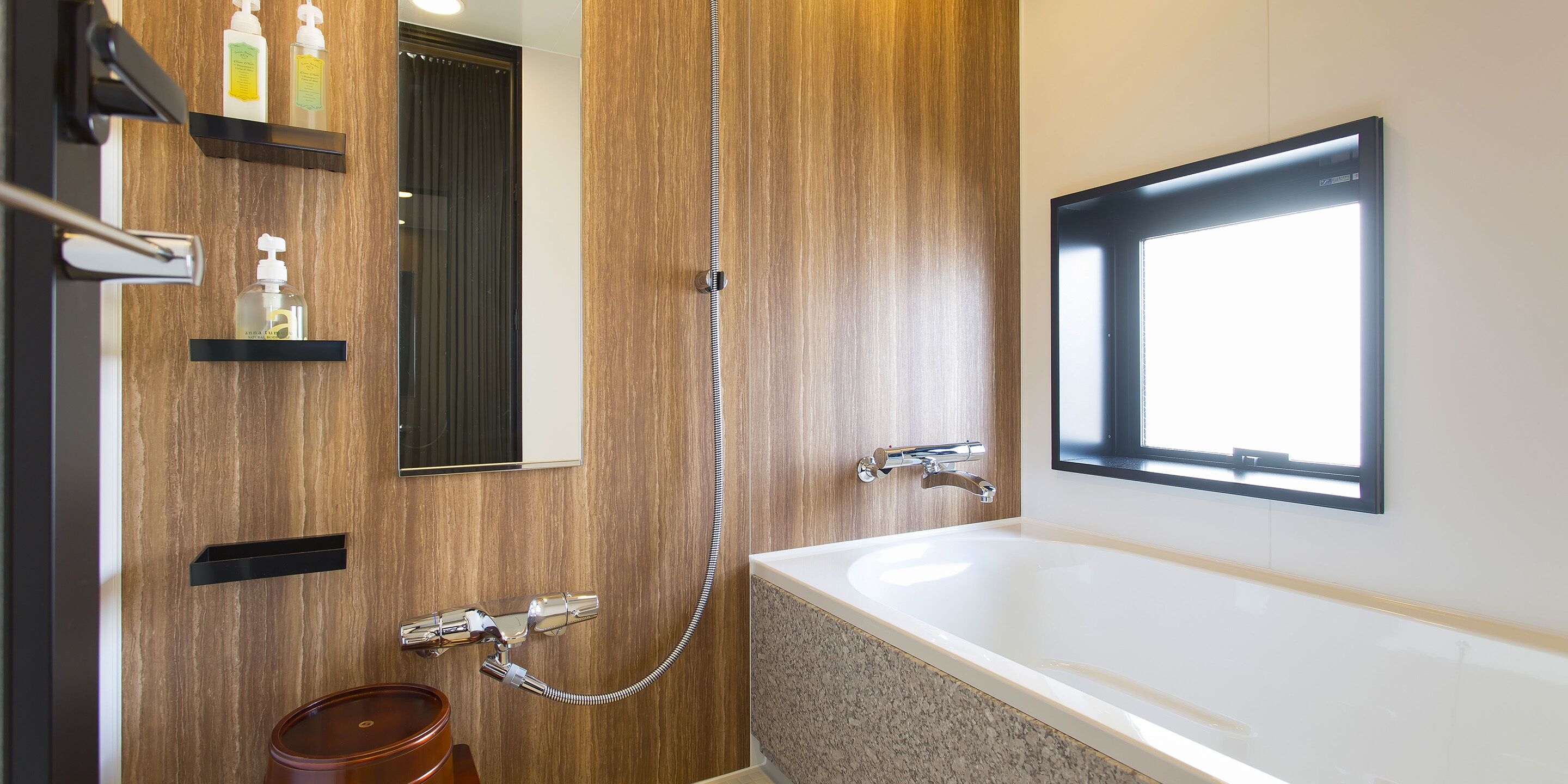 separate bathtub and shower, hair dryer, slippers, electronic bidet