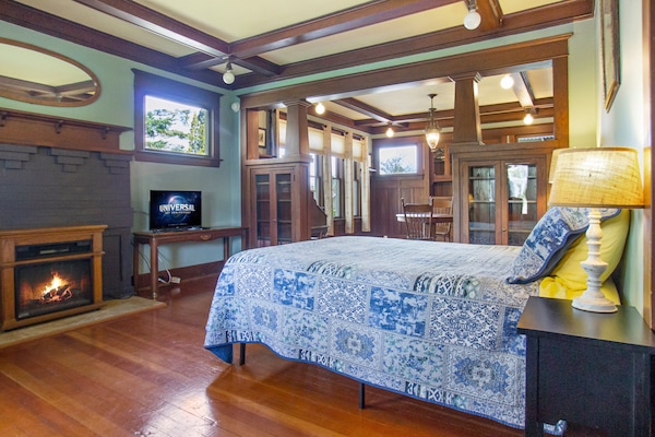 Queen bed, Smart TV, Electric Fireplace shown.
(Queen air mattress provided for the 3rd person.)
**Kitchenette means mini fridge, microwave, coffee maker, plates, cups. Toaster available upon request.**
This is a non-smoking property