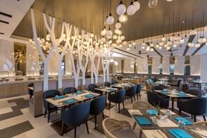 2 restaurants, breakfast, lunch served; local and international cuisine  - The Nature Phuket (Patong)