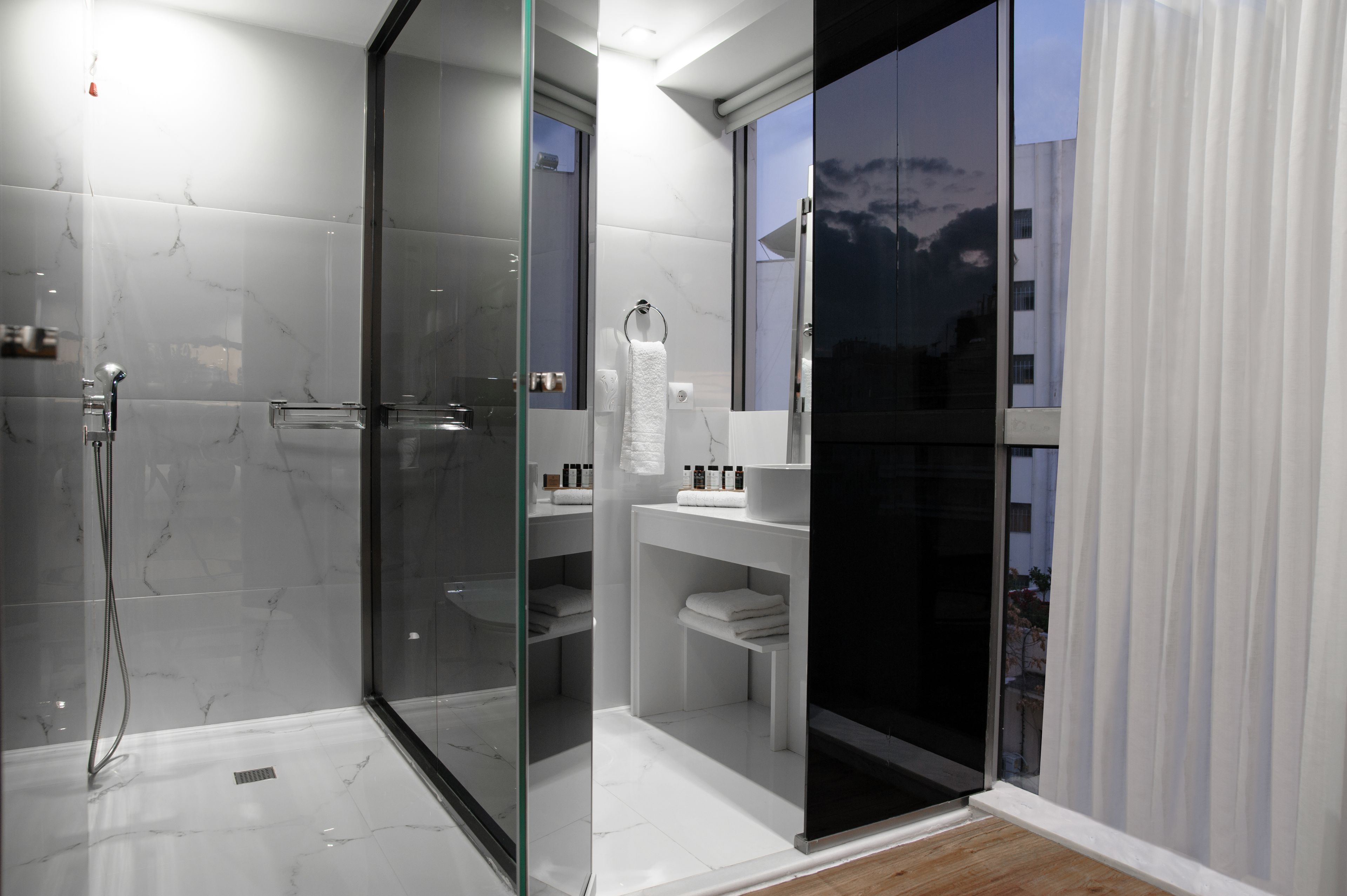 lifestyle suite, acropolis view | bathroom | shower, free toiletries, hair dryer, bathrobes