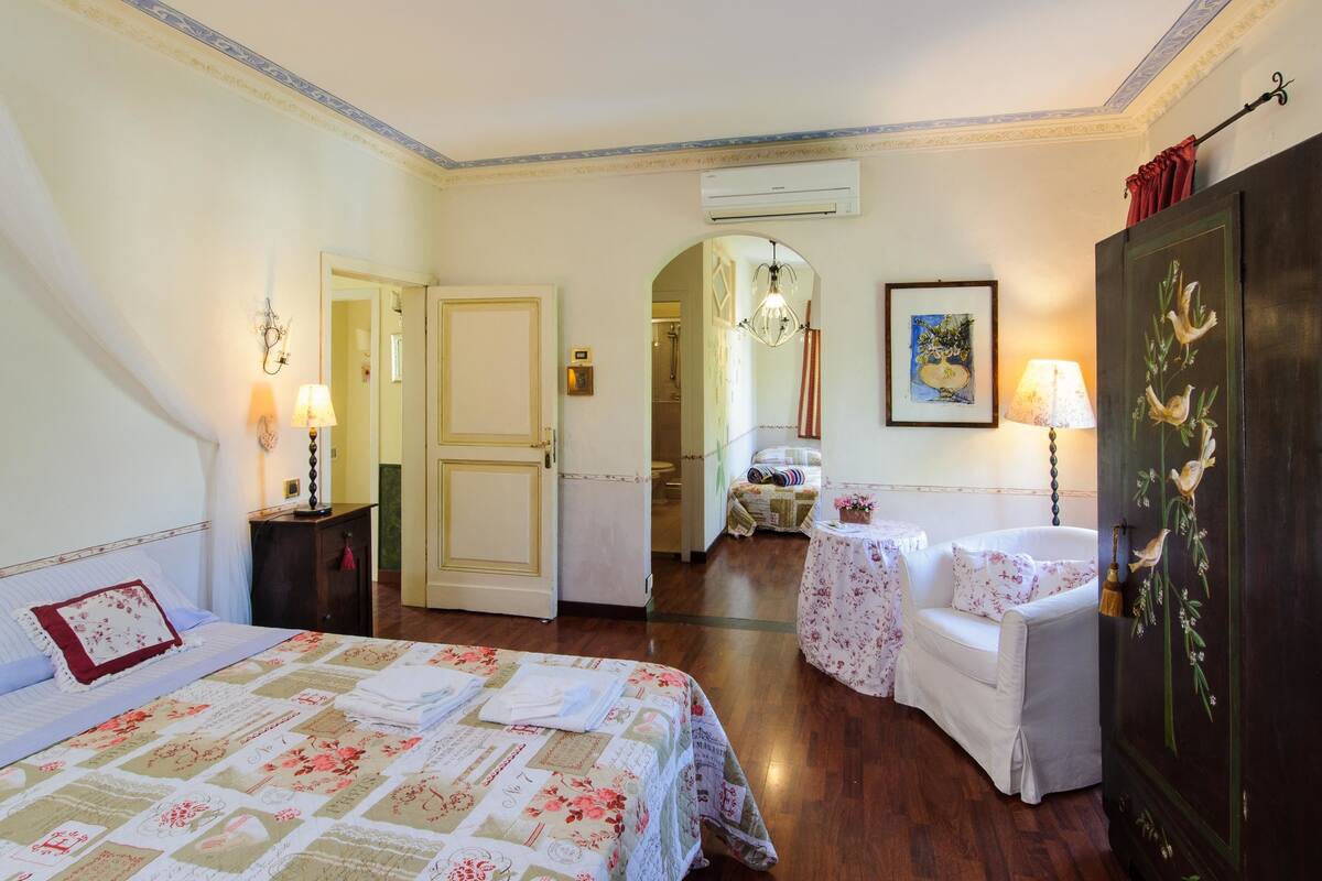 Quadruple Room, Garden View | Premium bedding, desk, iron/ironing board, free cribs/infant beds