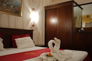 Double or Twin Room | Minibar, in-room safe, desk, rollaway beds