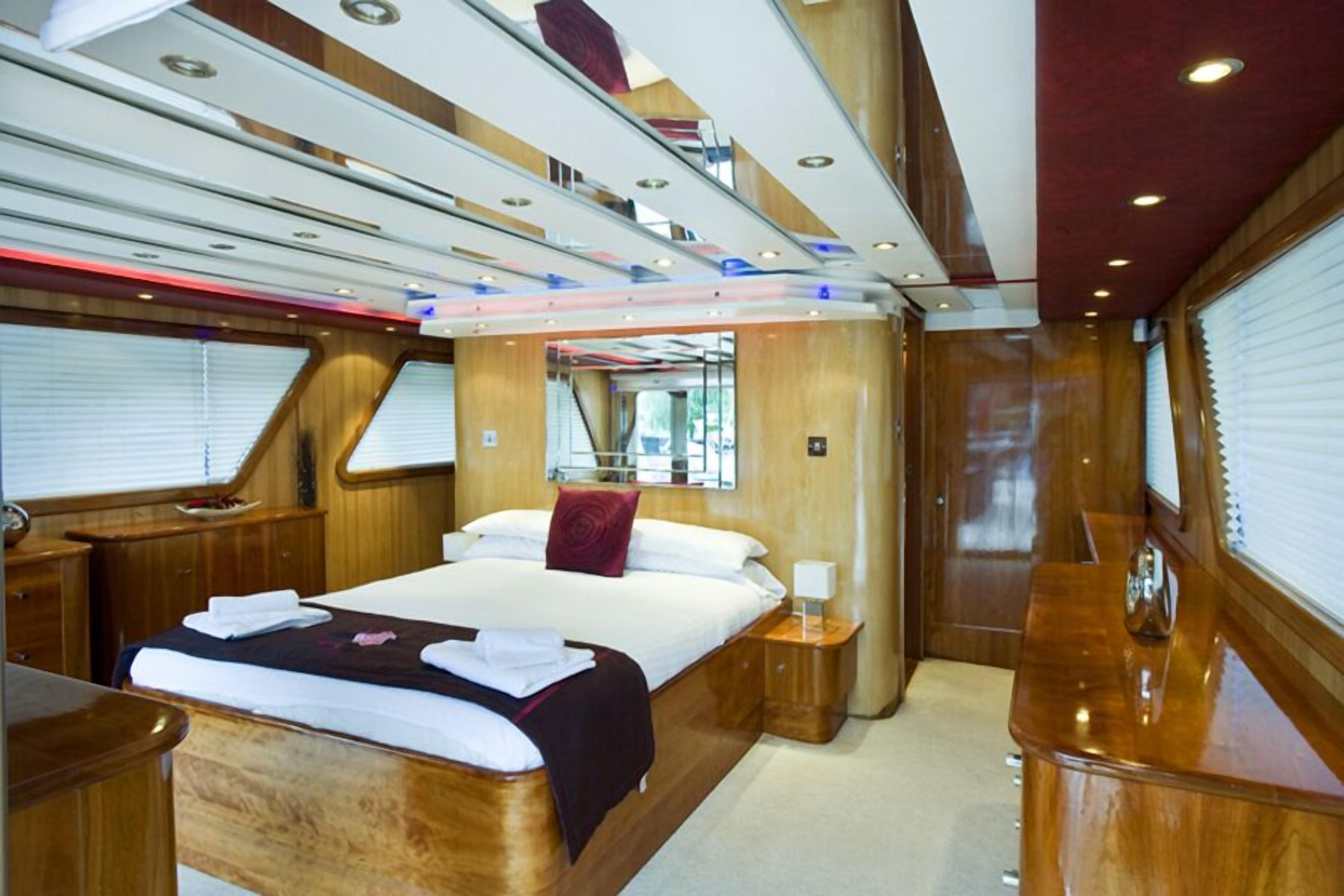 Luxury Upper Deck State Room, 1 Queen Bed, Ensuite, City View | 1 bedroom, premium bedding, in-room safe, iron/ironing board