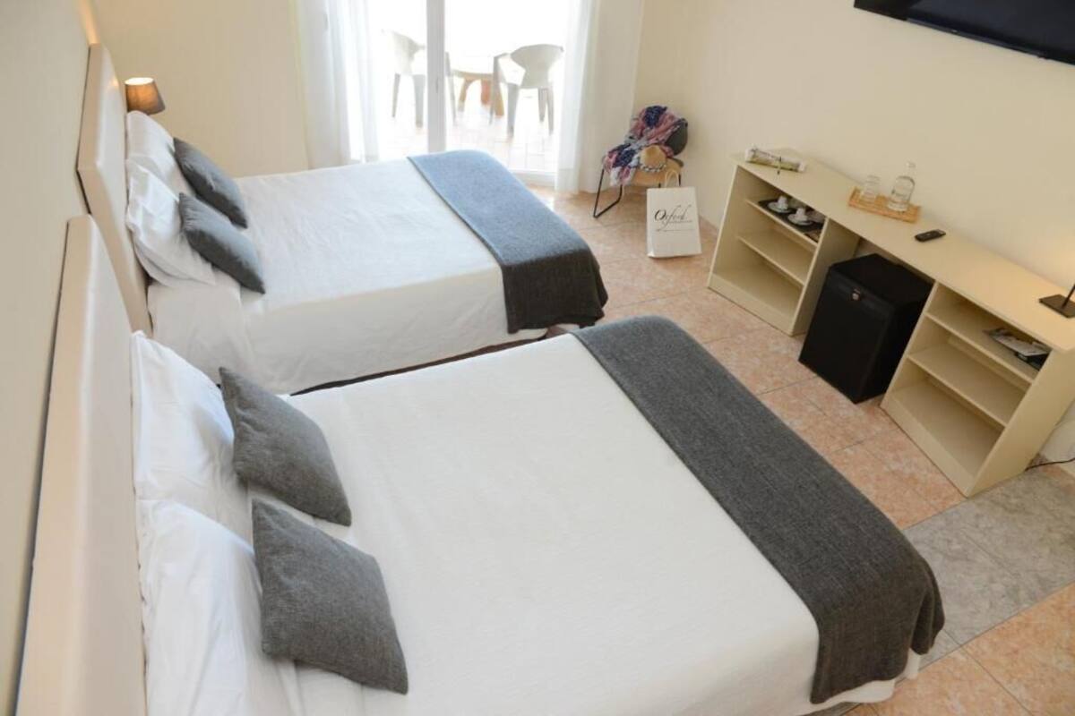 family quadruple room | 1 bedroom, minibar, in-room safe, desk