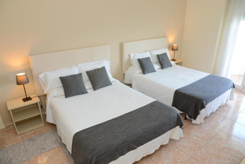 family quadruple room | 1 bedroom, minibar, in-room safe, desk