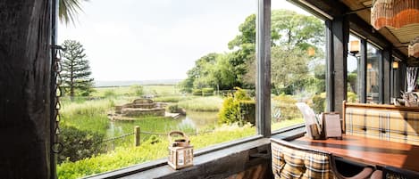 Breakfast, lunch, dinner served; British cuisine, garden views
