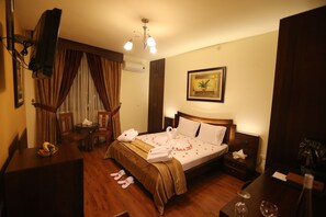 Ropa de cama de alta calidad y minibar 