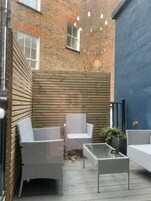 Habitación cuádruple clásica, baño privado (Roof garden) | Terraza o patio