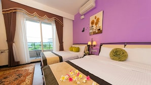 A hotel room with two beds, a purple wall, a window with curtains, and a balcony view. - Rice Countryside B&B (Dongshan)