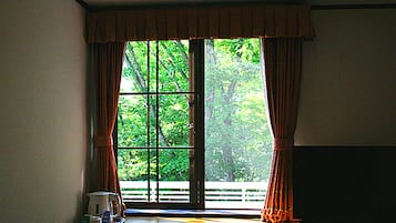 ラグジュアリー ダブルまたはツインルーム シングルベッド 2 台 禁煙 マウンテンビュー | 部屋からの景観