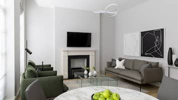 One Bedroom Platinum Suite w/ Terrace | Living area | 55-inch Smart TV with premium TV channels, TV, fireplace