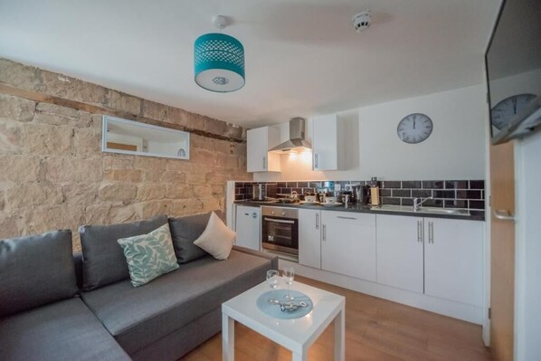 Appartement, 1 chambre | Coin séjour | Télévision à écran plat