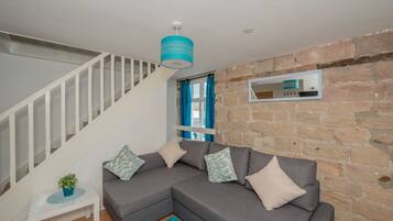 Apartment, 1 Bedroom | Living area | Flat-screen TV