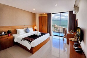 Exclusieve kamer, kamers met tussendeur, uitzicht op oceaan | Uitzicht op strand/zee