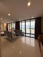 Executive Apartment, 1 Bedroom, Balcony, Ocean View | Living area | Flat-screen TV