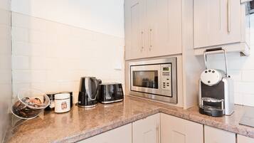 Appartement, 2 chambres | 2 chambres, fer et planche à repasser, Wi-Fi gratuit, draps fournis