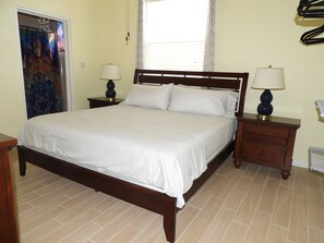 Deluxe Apartment, 2 Bedrooms, Garden Area | 2 bedrooms, premium bedding, pillow-top beds, blackout curtains