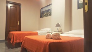Quarto standard, sem janelas | Camas extras/dobráveis (sobretaxa), Wi-Fi de cortesia, roupa de cama