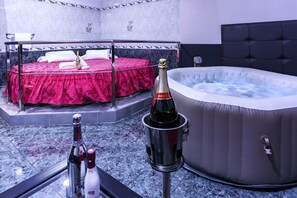 Suite Deluxe, hidromasaje | Camas extra, wifi gratis y ropa de cama