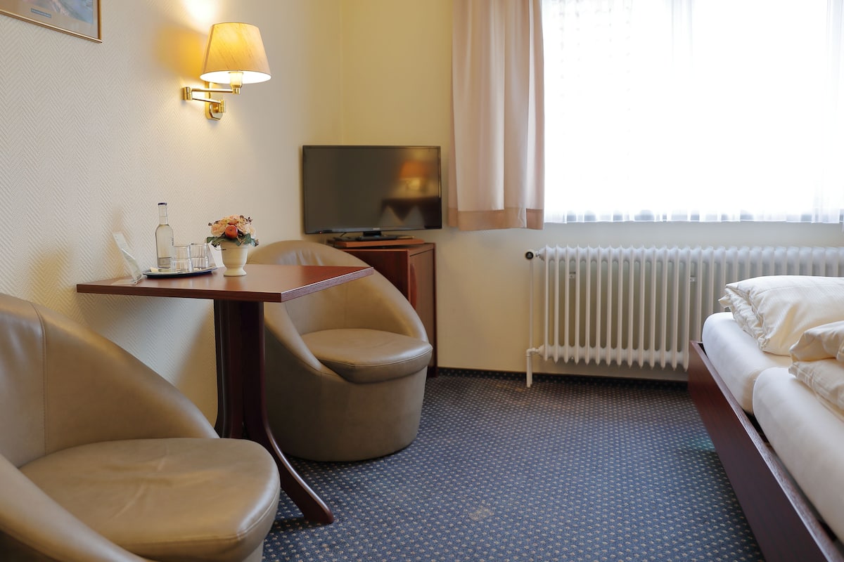 Doppia Comfort | Area soggiorno | TV a schermo piatto