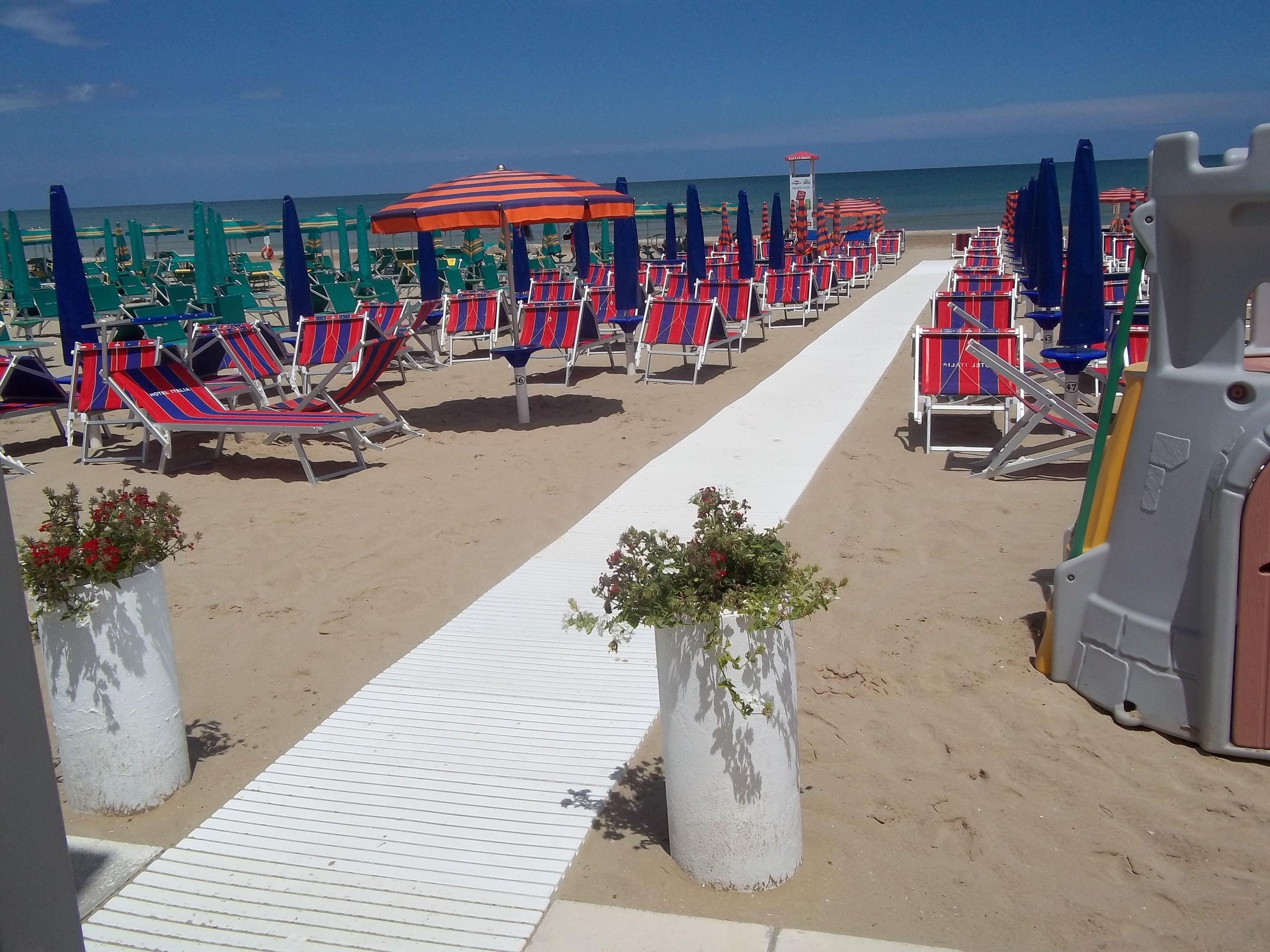 private beach, white sand, sun-loungers, beach umbrellas