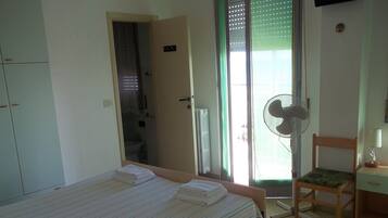 Triple Room, Balcony | In-room safe, desk, free WiFi, bed sheets