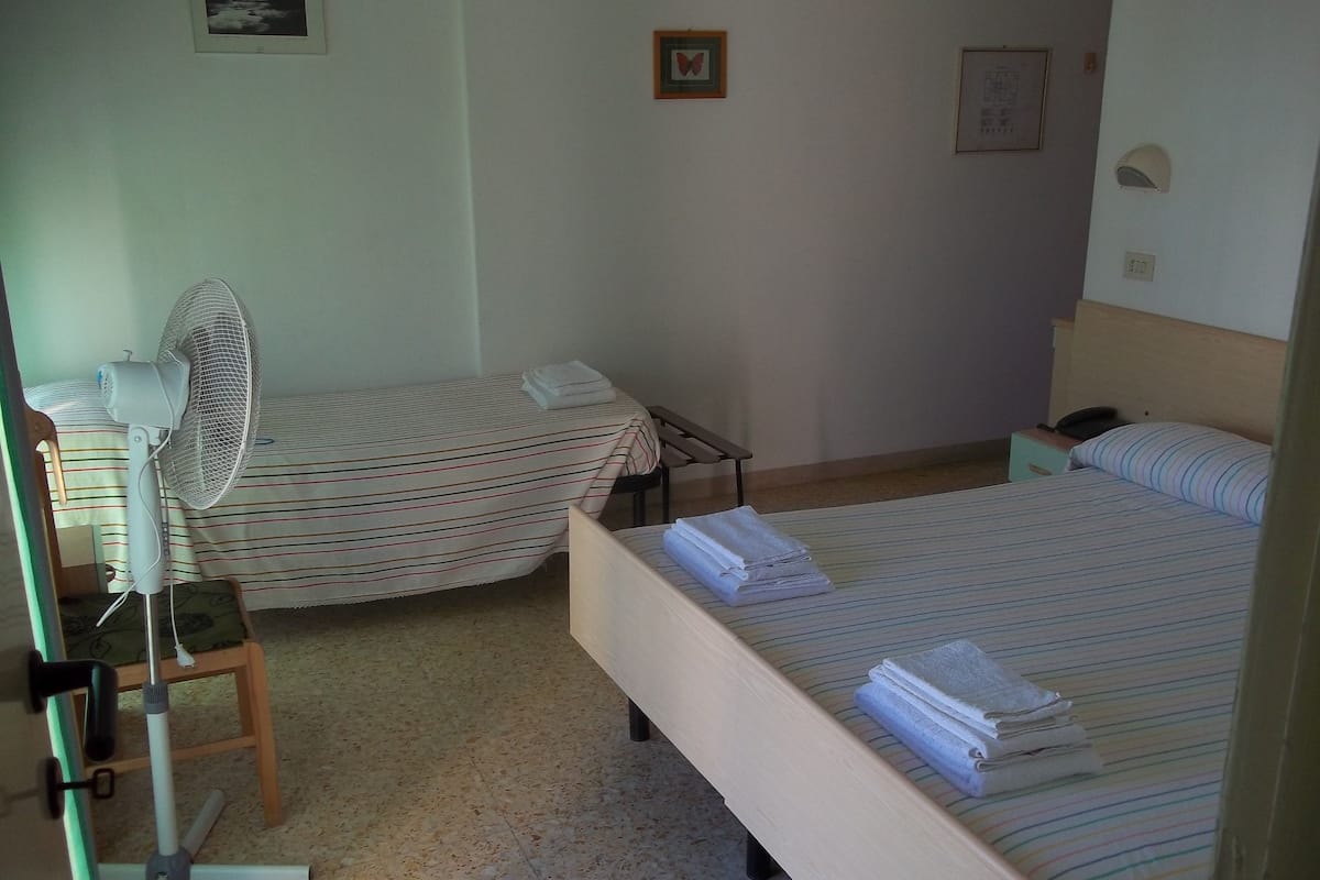 Triple Room, Balcony | In-room safe, desk, WiFi (free), bed sheets