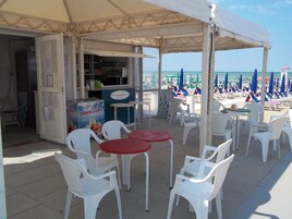 Private beach, white sand, sun loungers, beach umbrellas