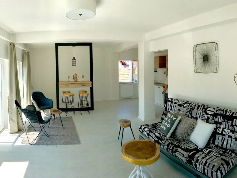 Deluxe Apartment, Hill View | Living room | Flat-screen TV