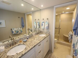 Shower, hair dryer, towels - The Shore 211-Stylish 2BR Gulffront Condo with Stunning Sunsets & Pool by RVA (Longboat Key)