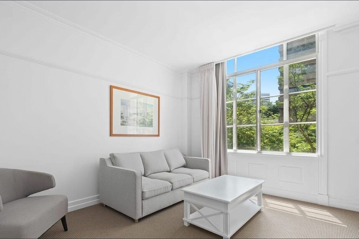 2 bedrooms, blackout curtains, soundproofing, iron/ironing board