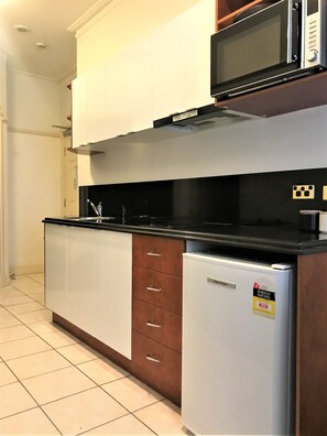 Mini-fridge, microwave, electric kettle, highchair