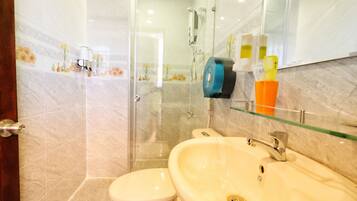 Designer toiletries, slippers, towels
