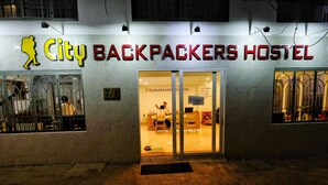 A hostel with a large sign reading "City Backpackers Hostel". - City Backpackers Hostel (Ho Chi Minh City)