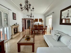 Flat-screen TV, fireplace