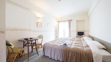 Basic Twin Room | Down comforters, desk, blackout drapes, free WiFi