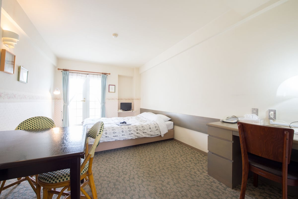Basic Double Room | Down comforters, desk, blackout drapes, WiFi (free)