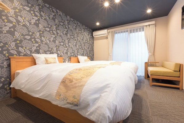 Chambre Standard avec lits jumeaux | Coffre-fort, accès au Wi-Fi (inclus), literie fournie