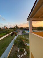 Panoramic Triple Room, Pool View (21) | Terrace/patio