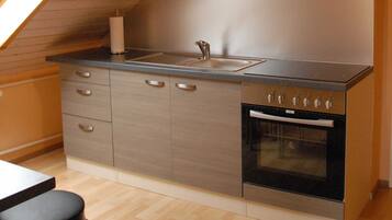 Fridge, microwave, oven, high chair