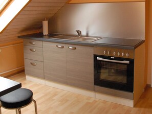 Fridge, microwave, oven, high chair