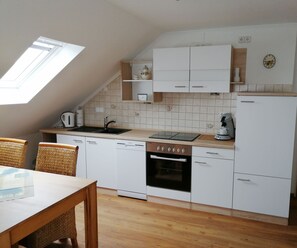 Fridge, microwave, oven, high chair